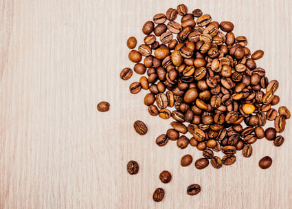 Grains de café éparpillés Grains de café éparpillés